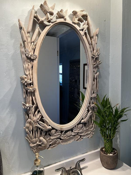 Nature inspired hand carved mirror