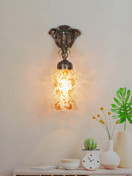 Exquisite Rustic Bronze Elephant Wall Sconce with Etched Amber Glass Shade