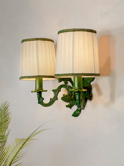 Elegant Double Green Grapevine Wall Sconce with Ivory Pleated Fabric Shades