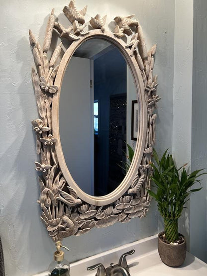 Nature inspired hand carved mirror