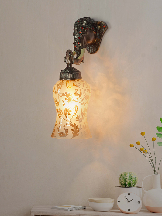 Exquisite Rustic Bronze Elephant Wall Sconce with Etched Amber Glass Shade