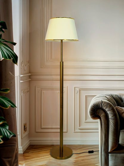 Simple Sophistication: Antique Brass Floor Lamp with Cream Shade