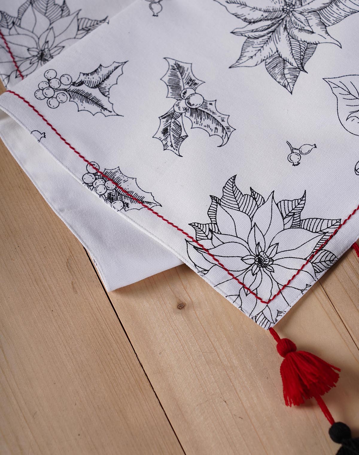 Christmas Table Runner | Black Poinsettia Print with Cascading Tassels | Cotton