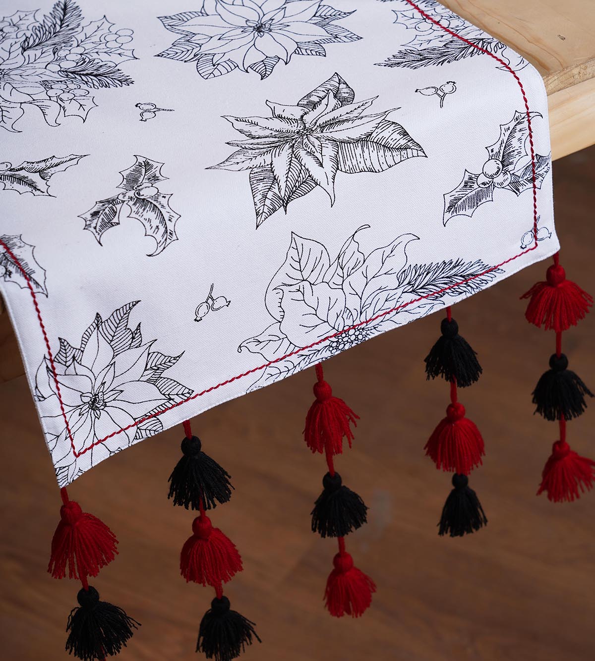 Christmas Table Runner | Black Poinsettia Print with Cascading Tassels | Cotton