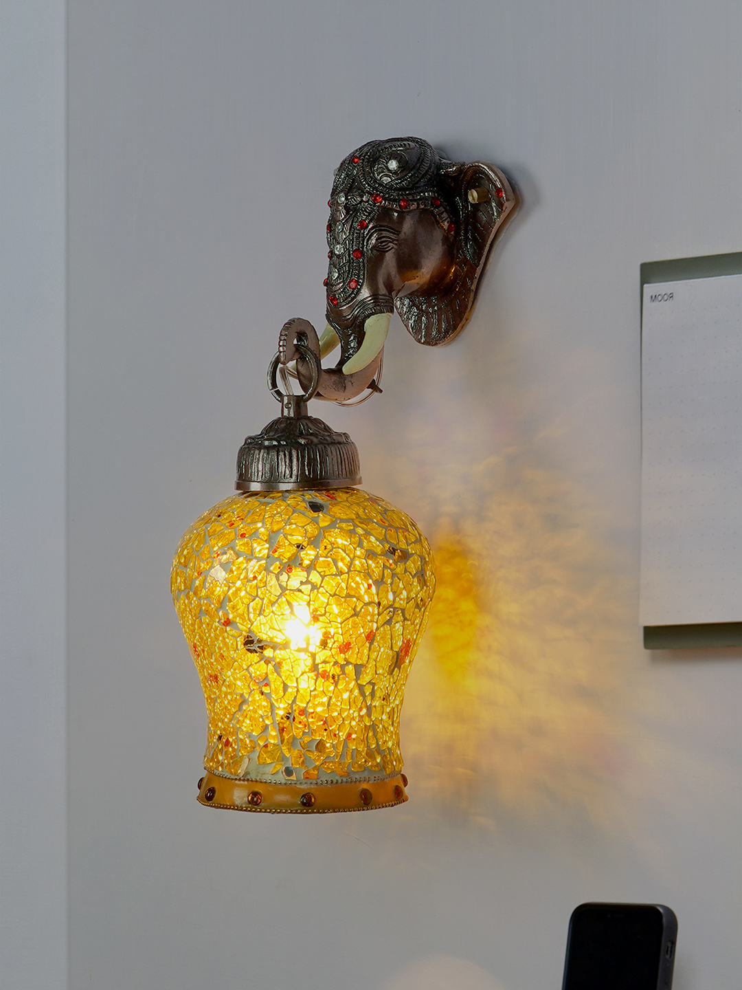 Exquisite Rustic Bronze Elephant Wall Sconce with Etched Amber Glass Shade
