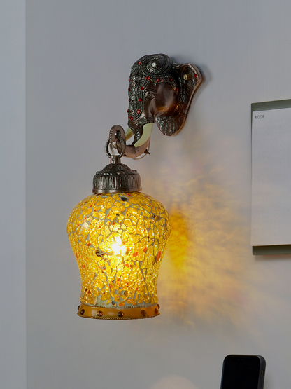 Exquisite Rustic Bronze Elephant Wall Sconce with Etched Amber Glass Shade