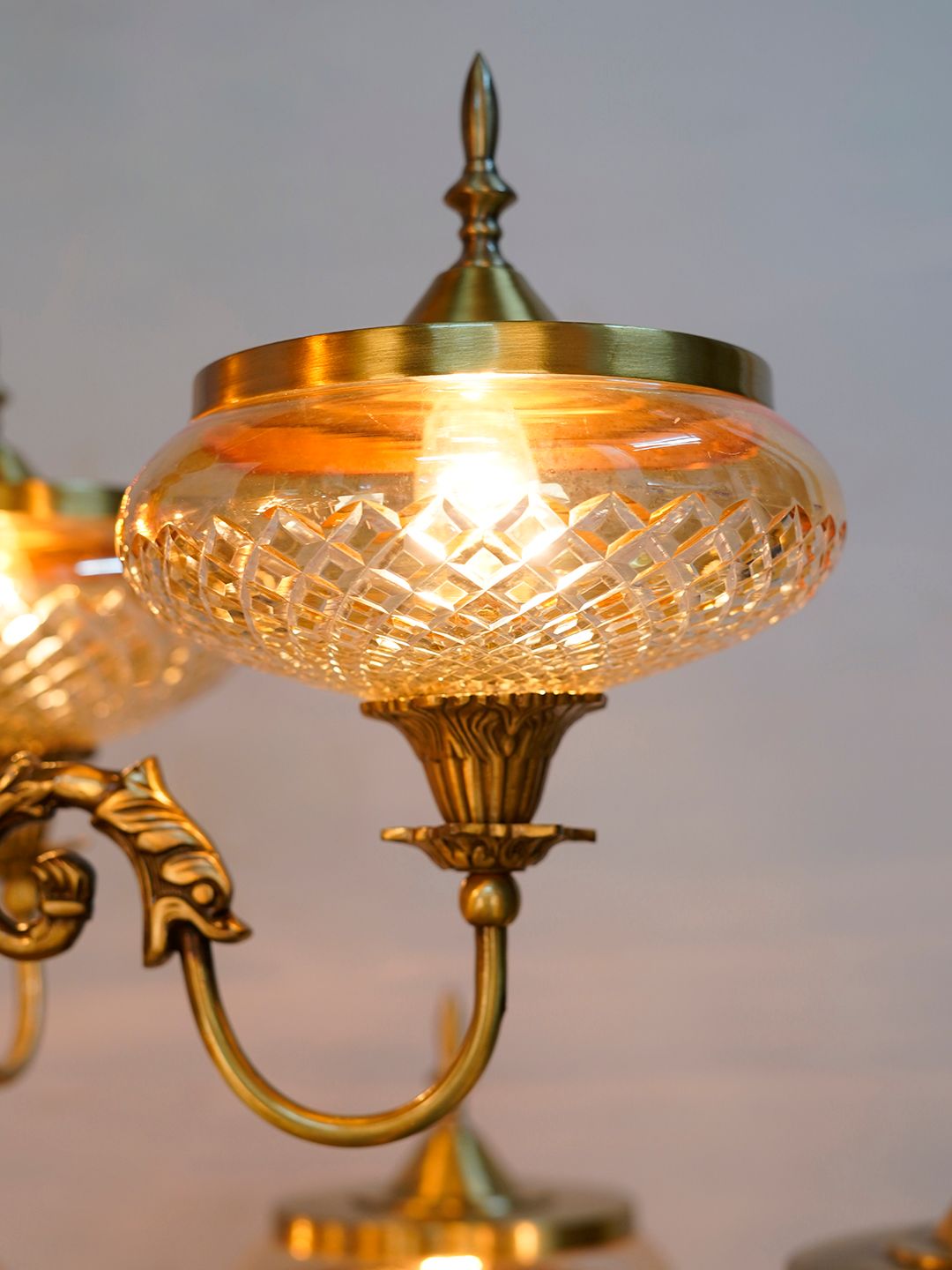 Exquisite Regal Brass 13-Light Chandelier with Golden Luster Cut Glass Shades