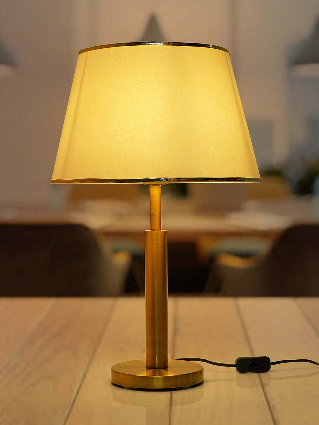 Transitional Brushed Brass Finished Metal Table Lamp with off-White Fabric Shade