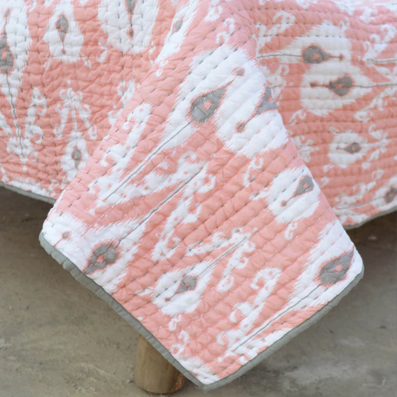 Quilted bedspread, ikat print coral colour cotton quilt, sizes available
