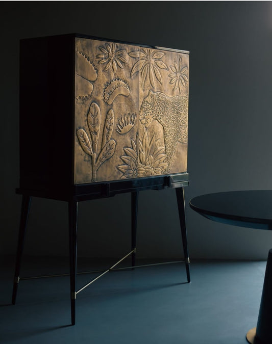 jungle theme inspired brass cladded bar cabinet