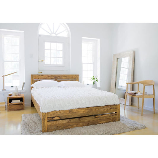 handcrafted natural finish wooden bed