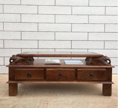Asgil coffee table with assorted hand carving elephants with 3 drawers.