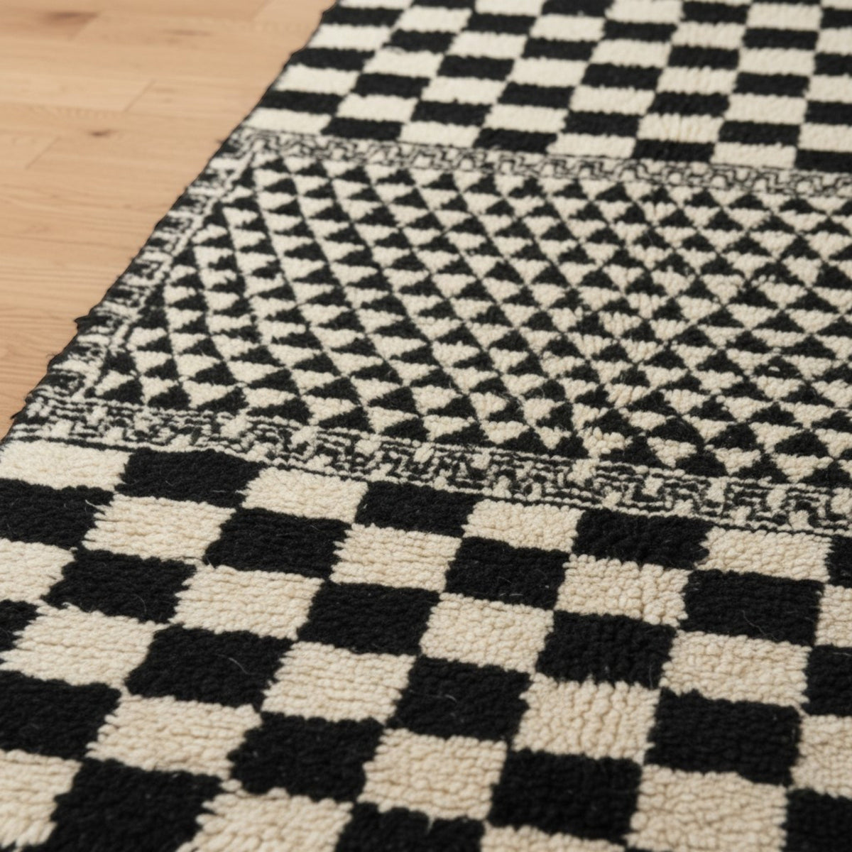 Checkerboard Patterned Area Rug With Geometric Design