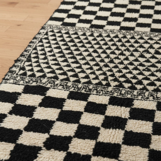 Checkerboard Patterned Area Rug With Geometric Design