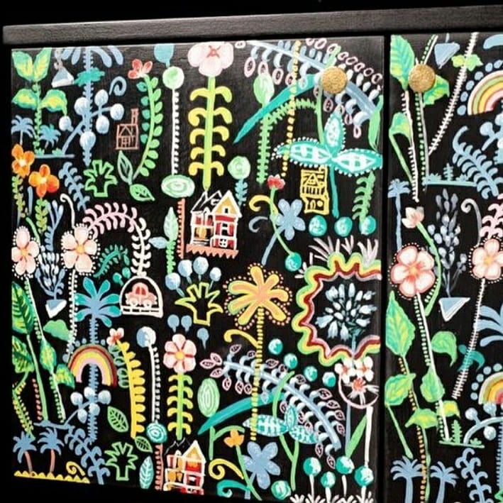 hand painted and handcrafted mid century retro sideboard close up