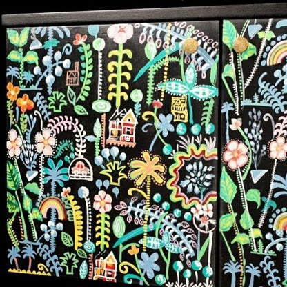 hand painted and handcrafted mid century retro sideboard close up