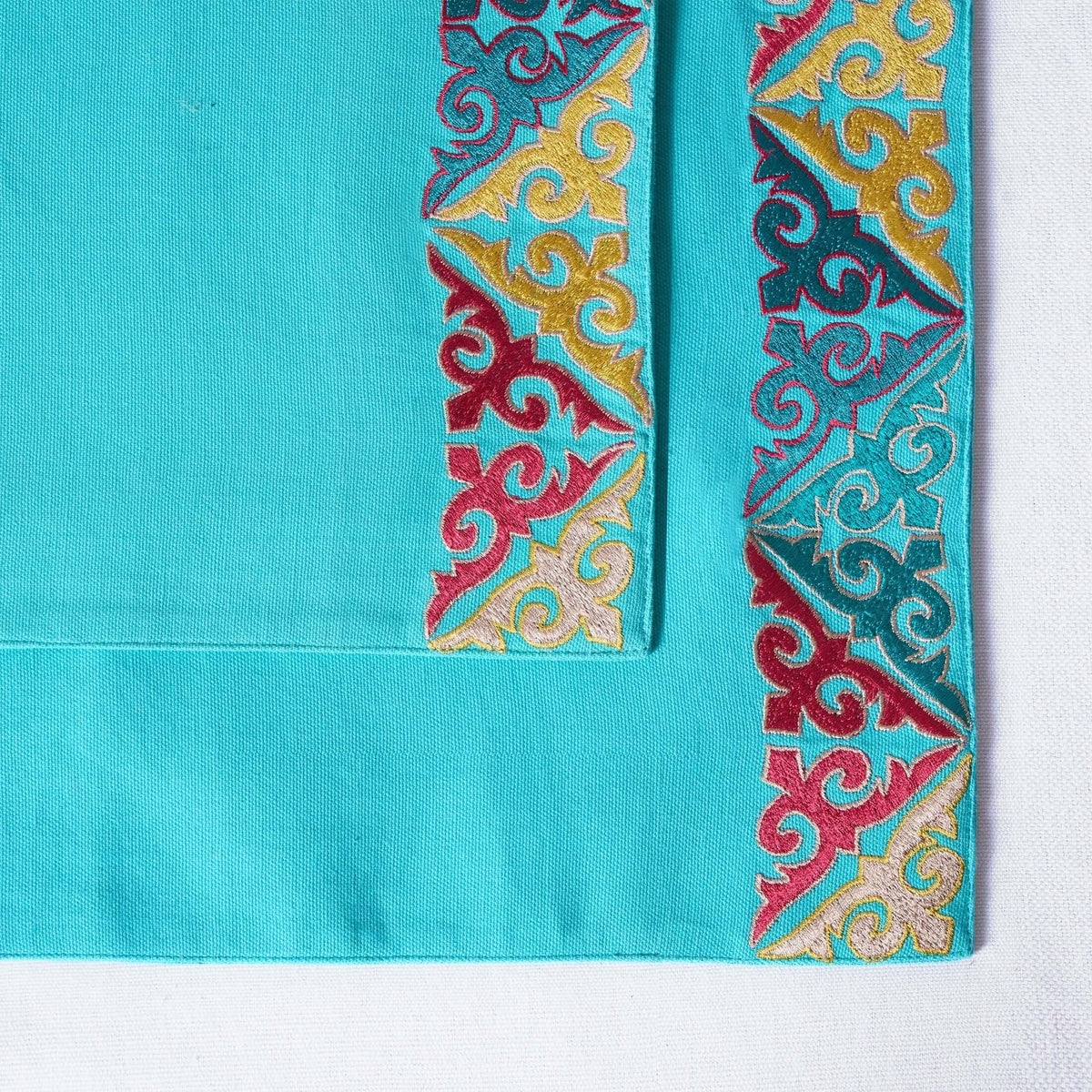 Kashidakaari Turquoise Placemat | Embroidered Geometric Border | Shyrdak-Inspired | 100% Cotton