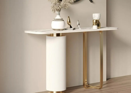 Its sculptural silhouette features interlocking curves and openwork detailing that give it an elegant contemporary look.