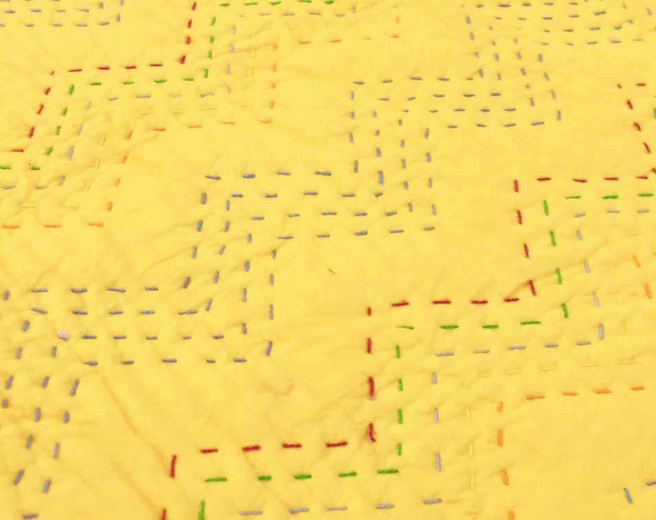 Yellow Kantha quilt - chevron pattern quilting